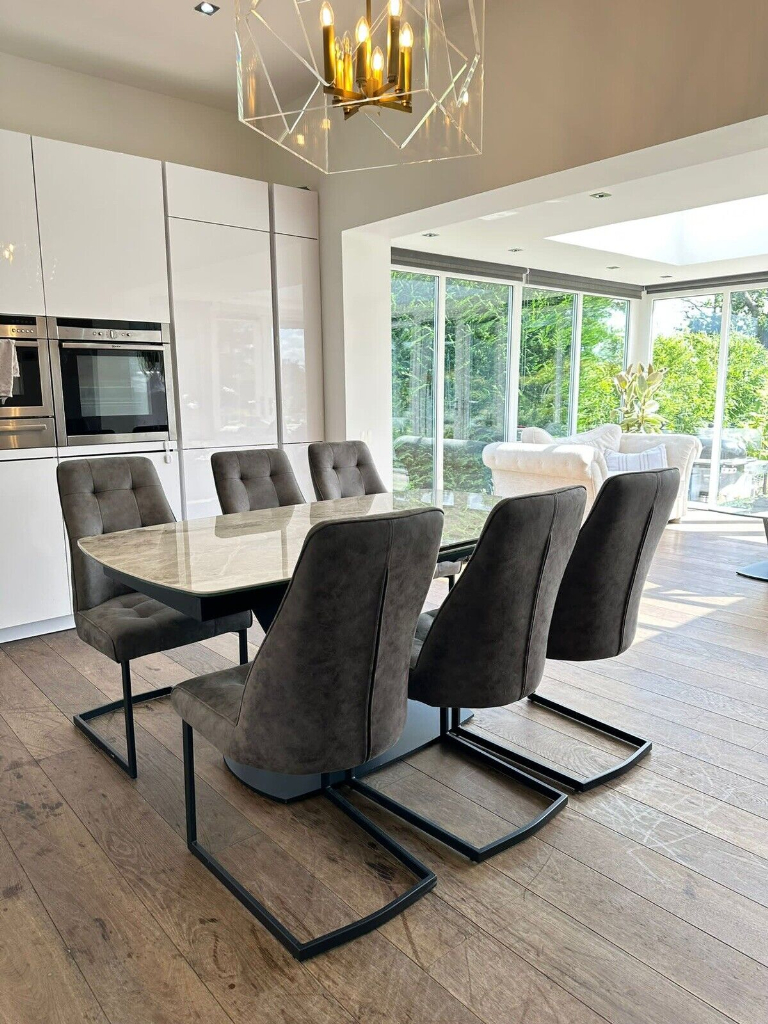 Merlin extending dining table deals