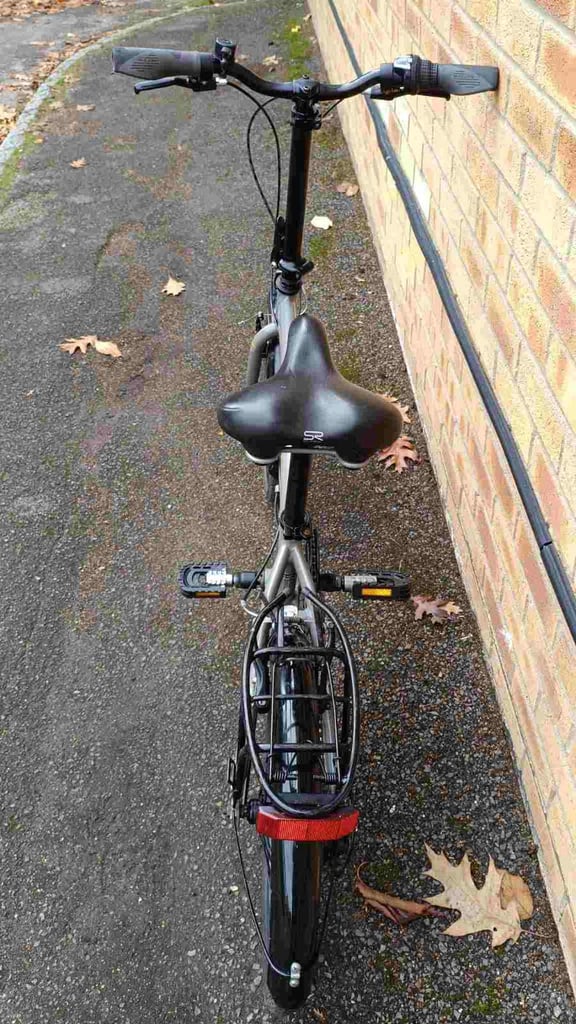 Raleigh Folding Bike in good condition with a comfort saddle, mudguards, rear pannier rack