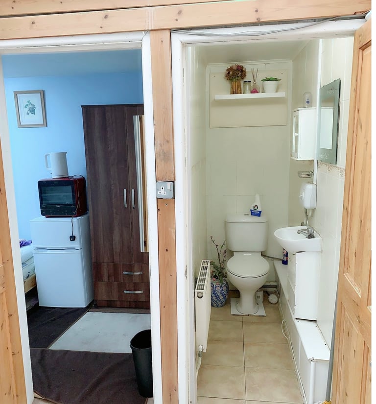 Single furnished room with separate toilet wash basin  