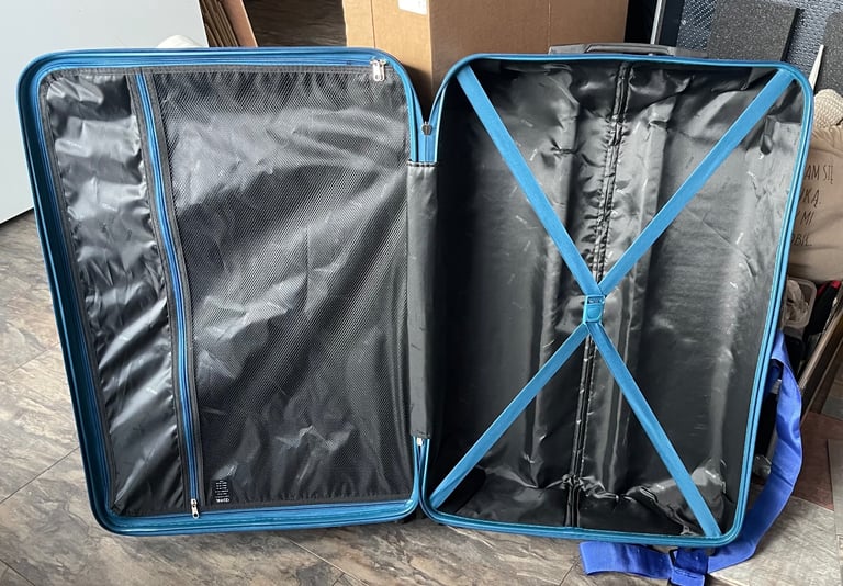 Large suitcase on wheels. Used just once on a return journey lightweight large 