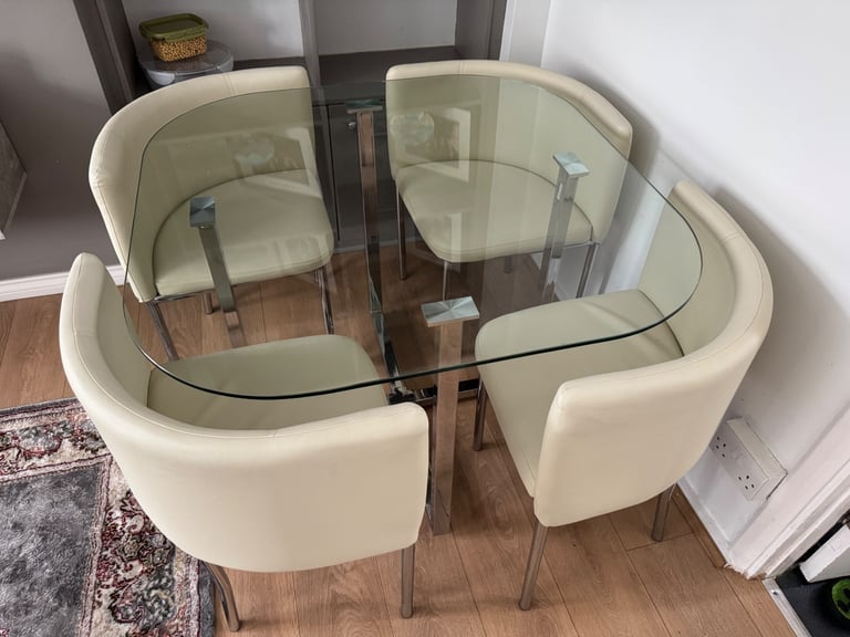 RRP £600 Stowaway dining table in cream finish with 4 chairs in excellent condition like new 