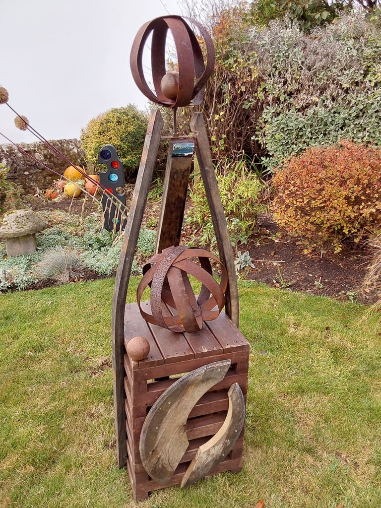 Garden art from whisky barrel materials 