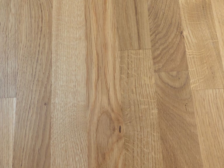 Solid Oak dinner table with cast iron base