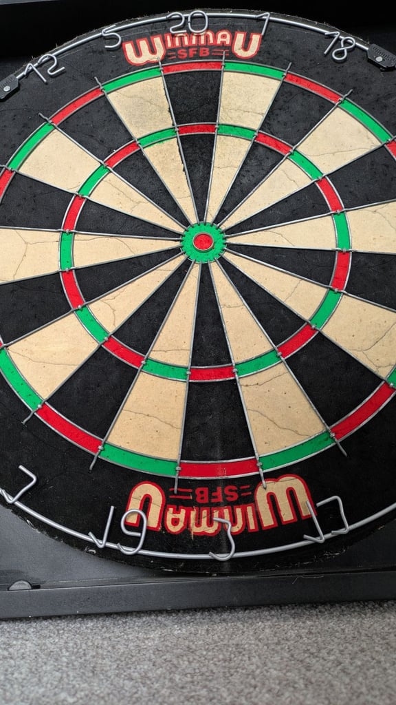 Vintage 1980's Winmau dartboard and Wooden cabinet with 3 sets of darts