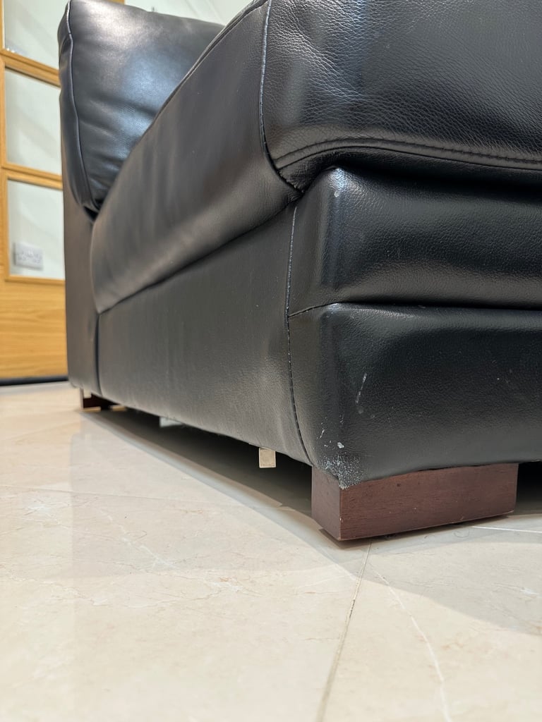 BLACK LEATHER SOFAS + FOOTSTOOL