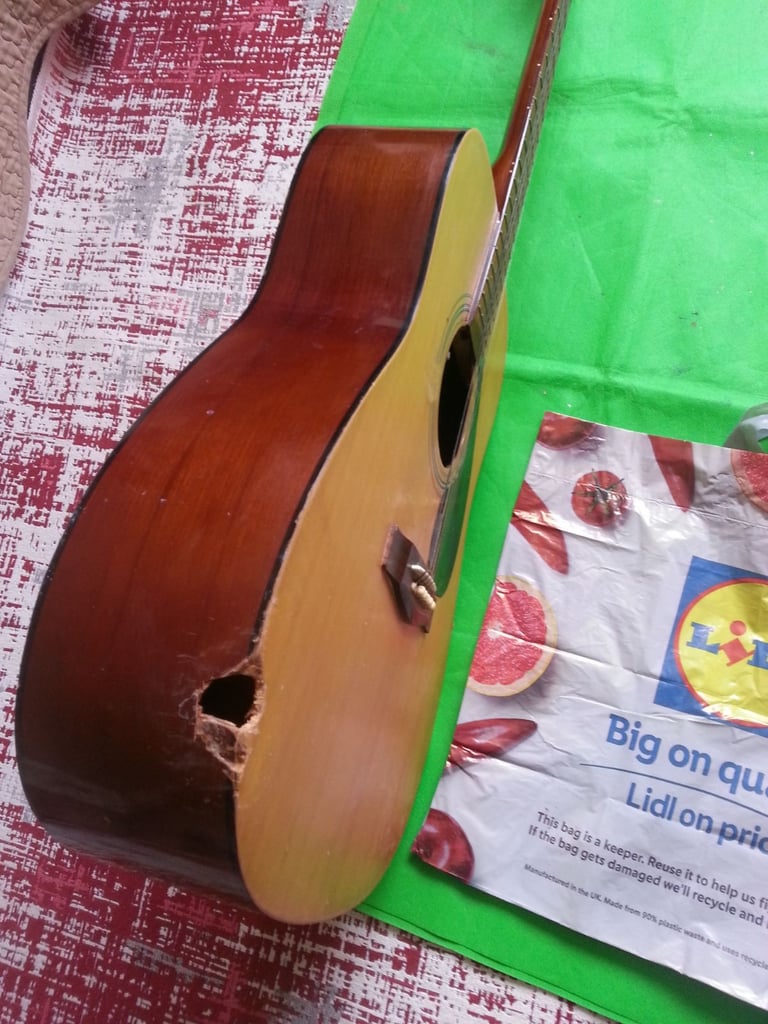Large size guitar with good sound quality