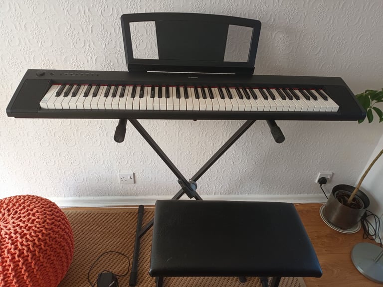 Yamaha Piaggero NP-31 Piano-style Keyboard with adjustable stand, seat, and FC4 Pedal. BARELY USED