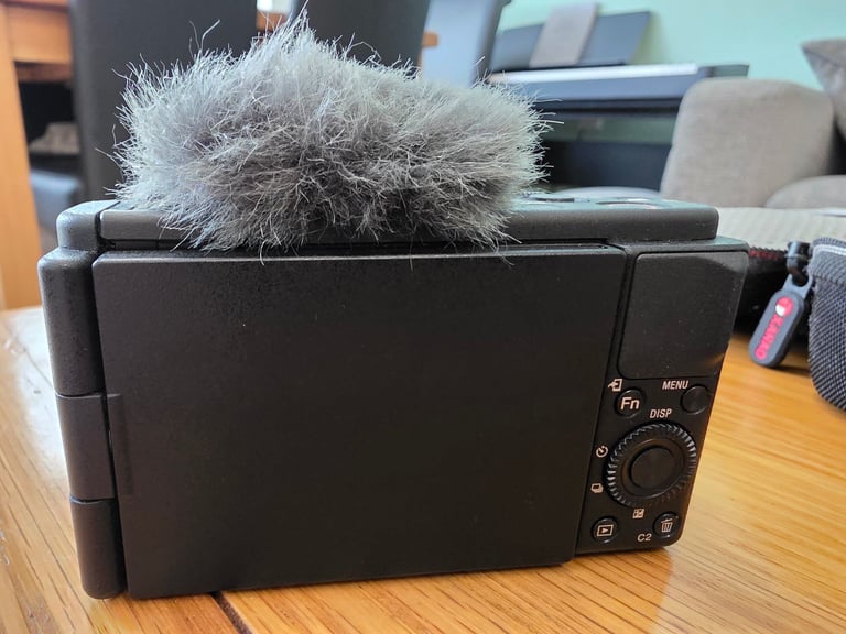 Sony ZV-1 vloggers camera with case, 4x batteries and  tripod camera grip