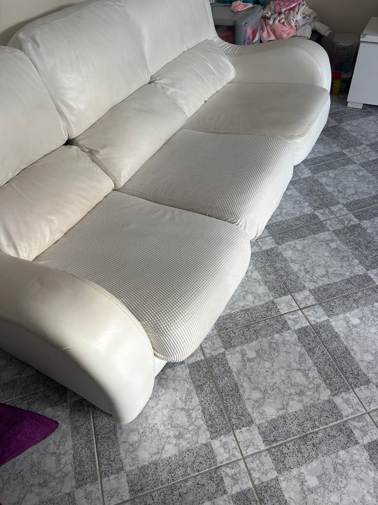 3 and 2 seater cream leather sofas