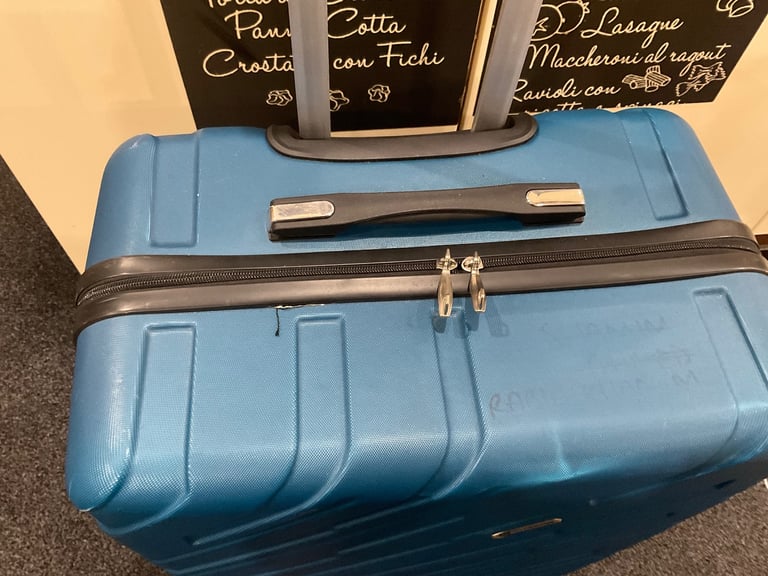 Used suitcase ATLASBAGS size 75x48x£29cm blue 4 wheels v.good condition £28