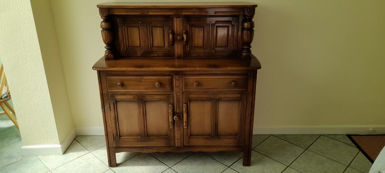 Ercol deals court cupboard