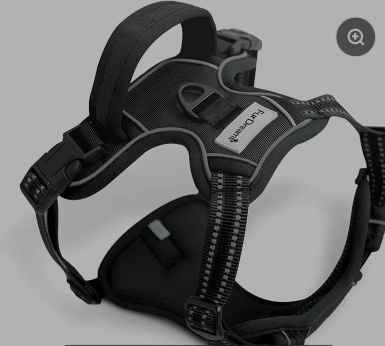 A new still packed black Secure Padded Dog Harness  
