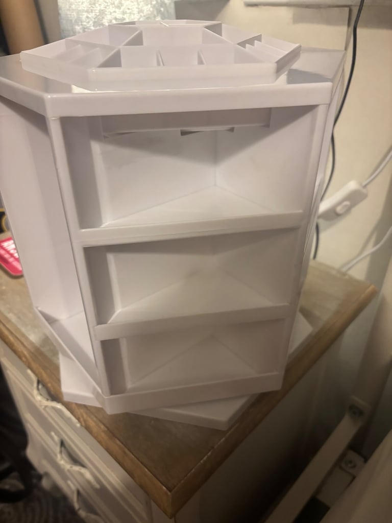 Rotating storage organiser 