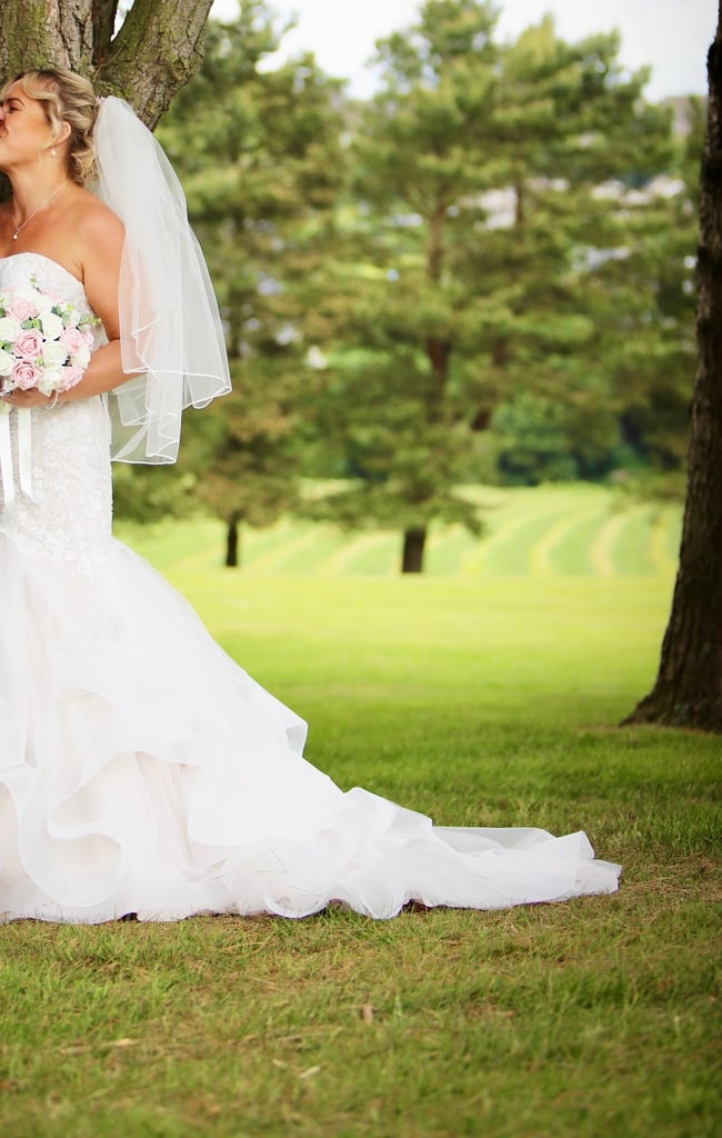 Blush wedding gown with underskirt and veil 