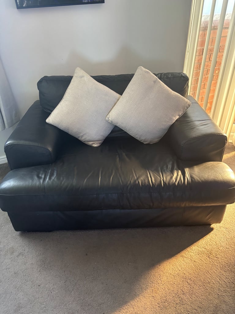 Black leather sofa and chair 