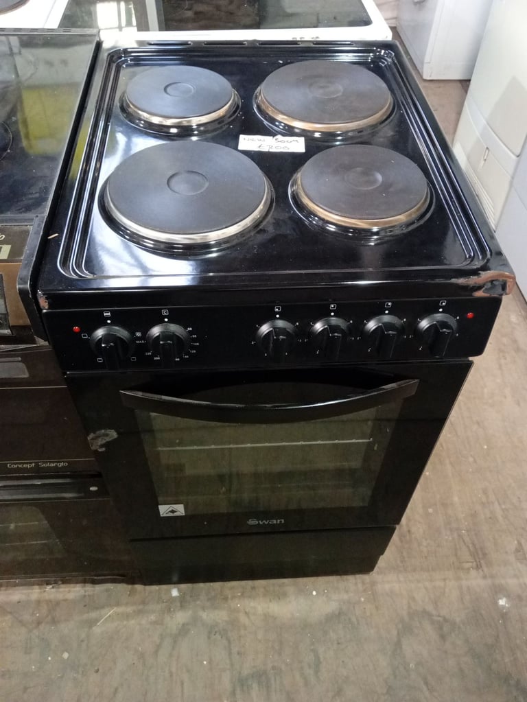 Swan 50cm black electric cooker with oven brand New with a dents on top side  £200