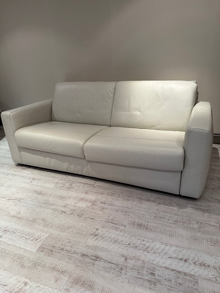 Natuzzi (Brand) cream leather sofa bed 