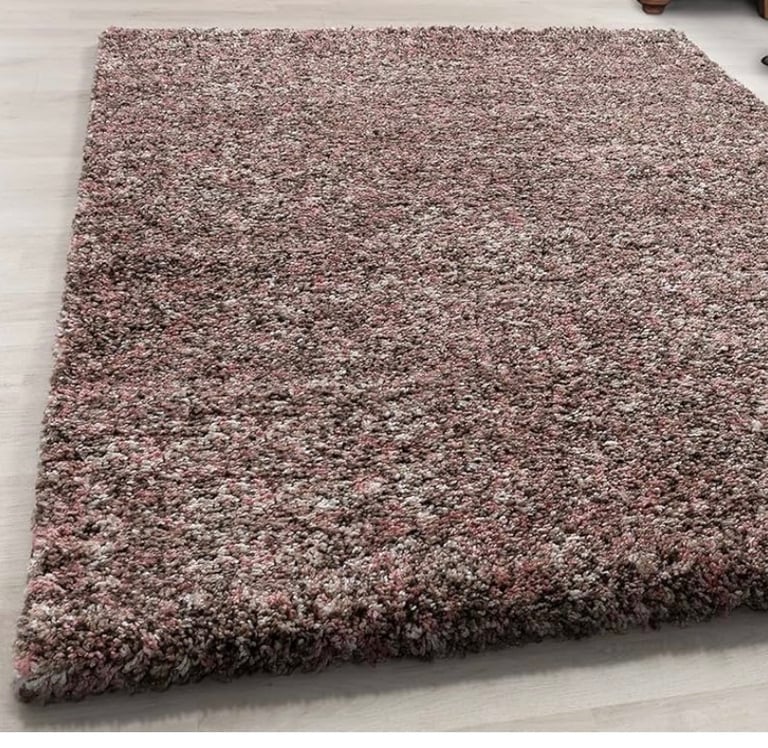 Brand new multicoloured rugs.  £30 each 
