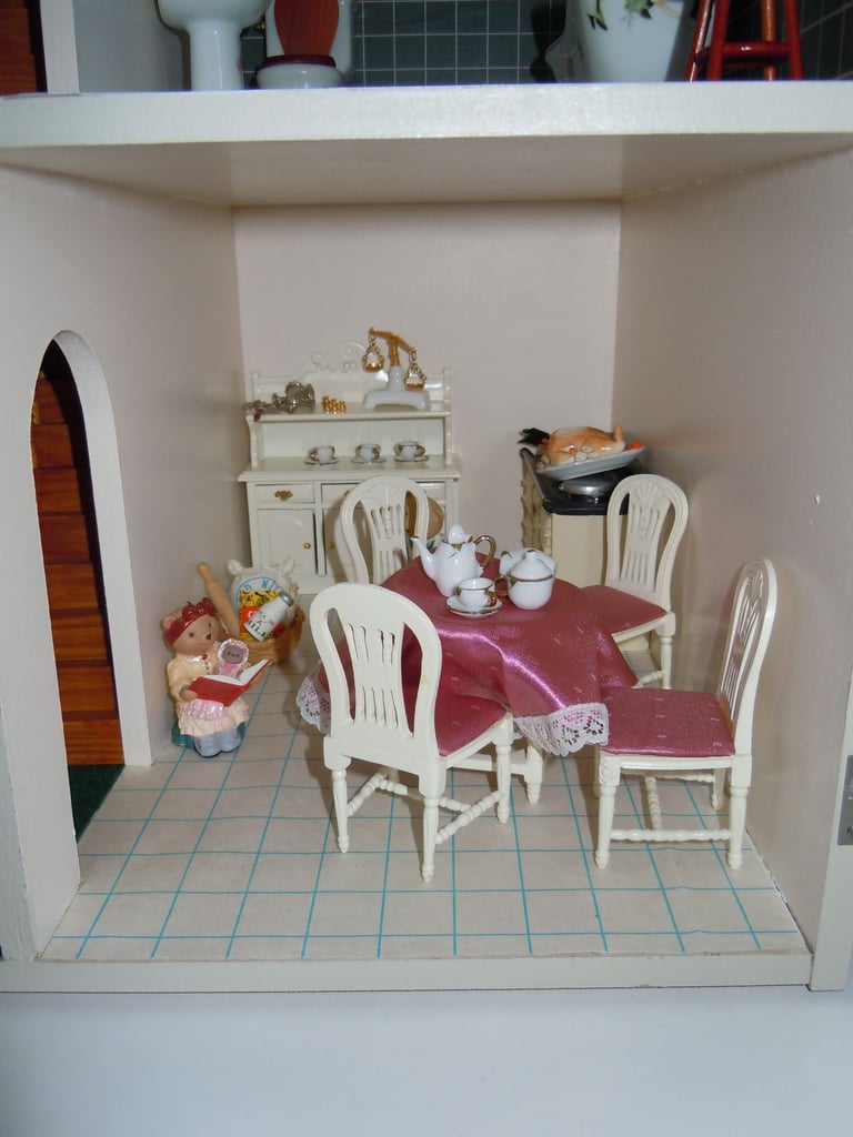 Dolls House complete with Furniture,Figures,Toys,Crockery,Pans,Xmas decorations and Accessories
