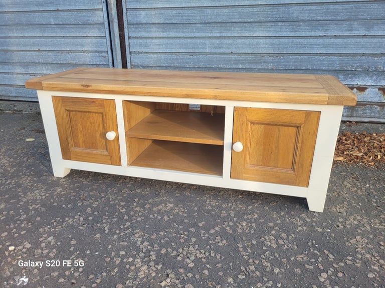 Solid oak topped television unit, delivery available 