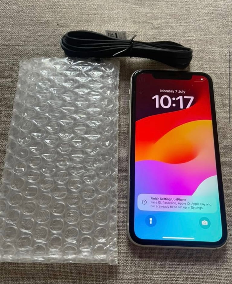 image for Brand new condition iPhone 11, Unlocked, white, 32gb, 3 months warranty.