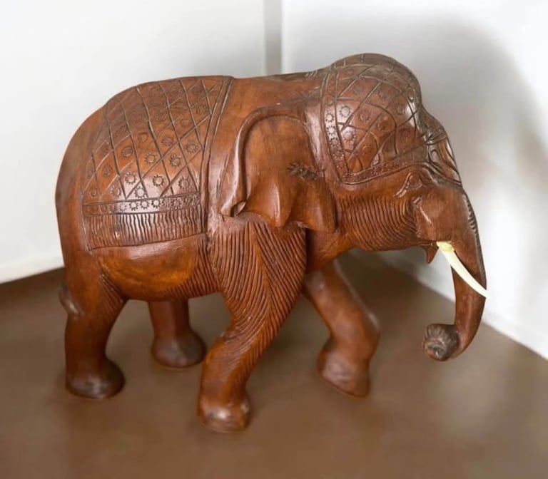 Beautiful heavy carved vintage wooden elephant with beautiful markings
