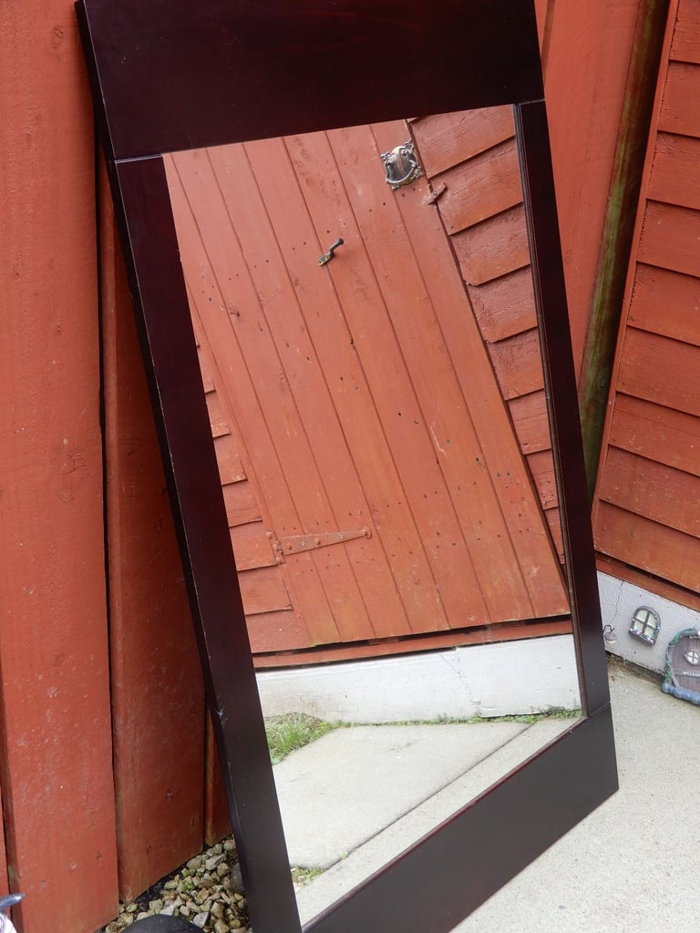 Large wall mirror with wooden frame
