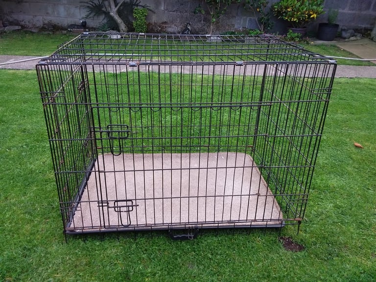DOG CAGE.