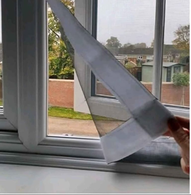 Flat Cats white Mesh window cover to pet proof windows  