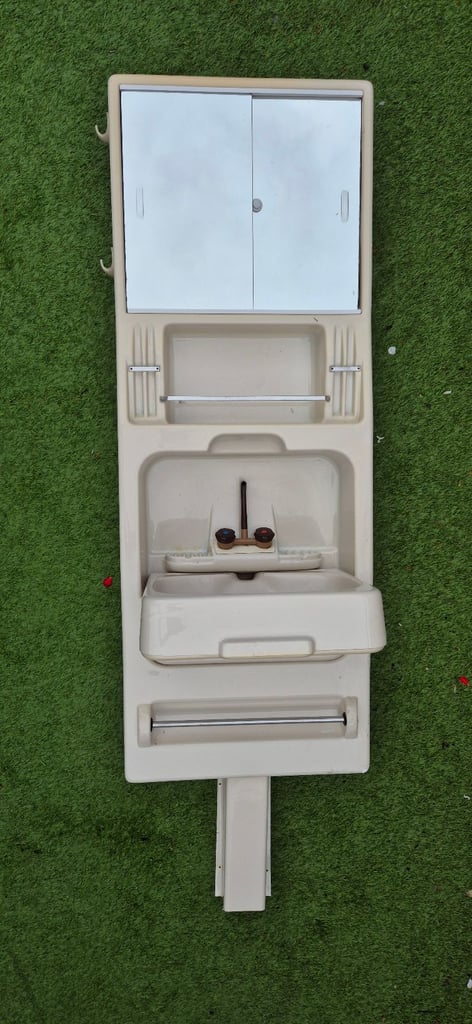 Vanity unit with folding sink for camper caravan motorhome boat.