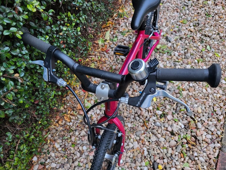 Islabike CNOC 14 kids bike for sale. Pink