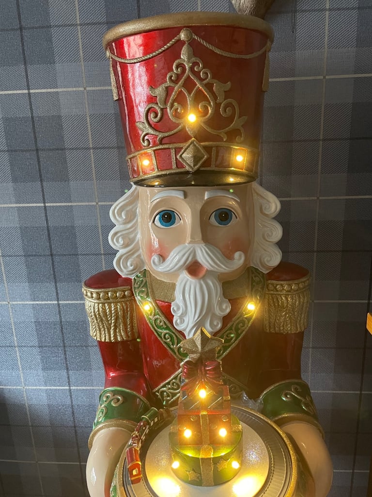 Large Christmas nutcracker 5ft tall lights up and plays music. Like new