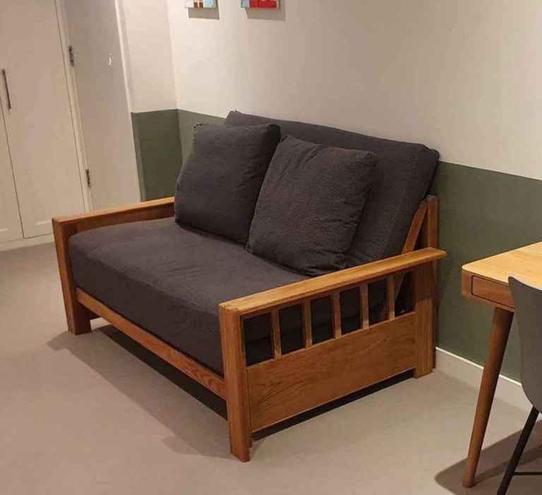 Futon Company solid oak two seater sofa bed Vienna model excellent condition