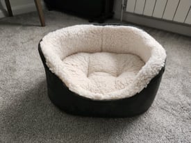 Cat or small dog soft fur bed.