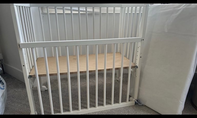 image for Baby cot bed with new mattress. 