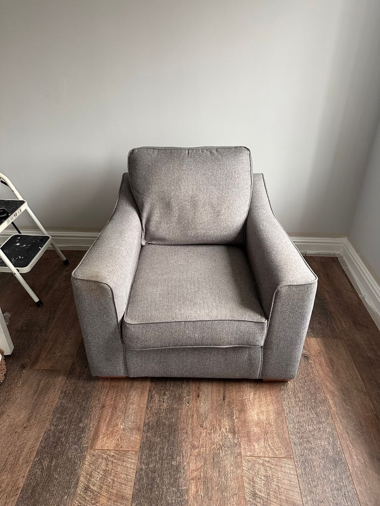DFS grey armchair 
