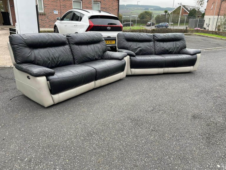 3 and 2 seater sofa in black leather from DFS all reclining only £350 