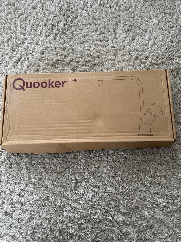 Quooker stainless steel round Fusion tap.