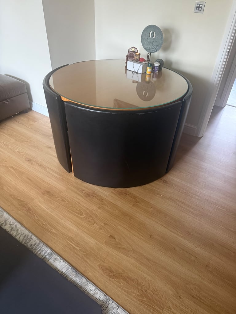 image for Round Glass Dining Table wish 4 Dark Brown Leather Chairs – £50 (Collection Only)