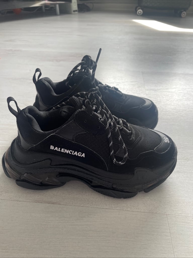 Black balenciaga triple s trainers 