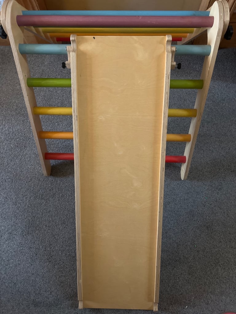 Sawdust and rainbows climbing triangle and slide