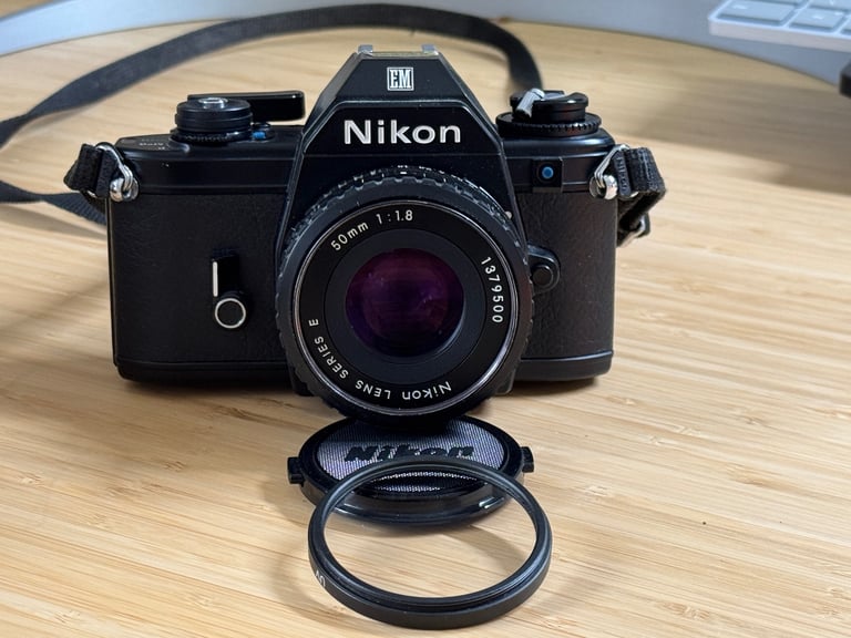 image for Nikon EM 35mm SLR film camera With E Series 50mm f/1.8 Prime Lens 