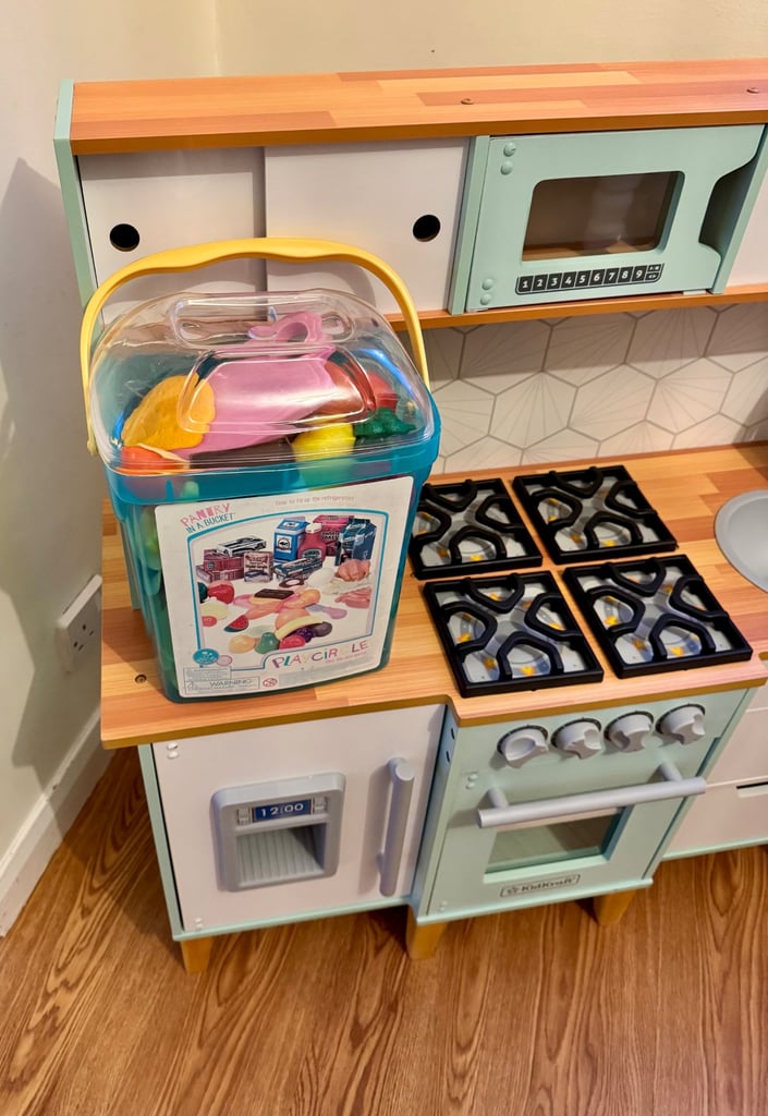 Children’s play kitchen with accessories