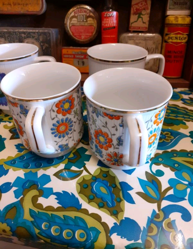 Unused retro mugs. Has gold coloured edging. Made in Poland. 
