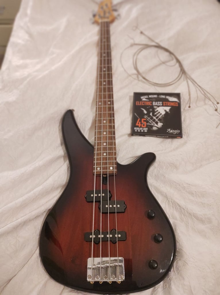 Yamaha RBX170 4 String Bass. Line 6 LD 15watt Bass Amp. Both in Mint Condition . Lots of Extras