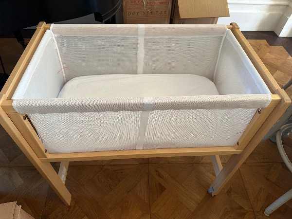 Boori bassinet plus crib -good condition. 1 month used. Sleepy wrap sling includeed