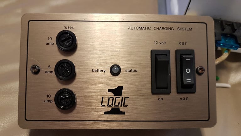 LOGIC 1 power supply and battery charger with panel control for camper, caravan, motorhome or boat.