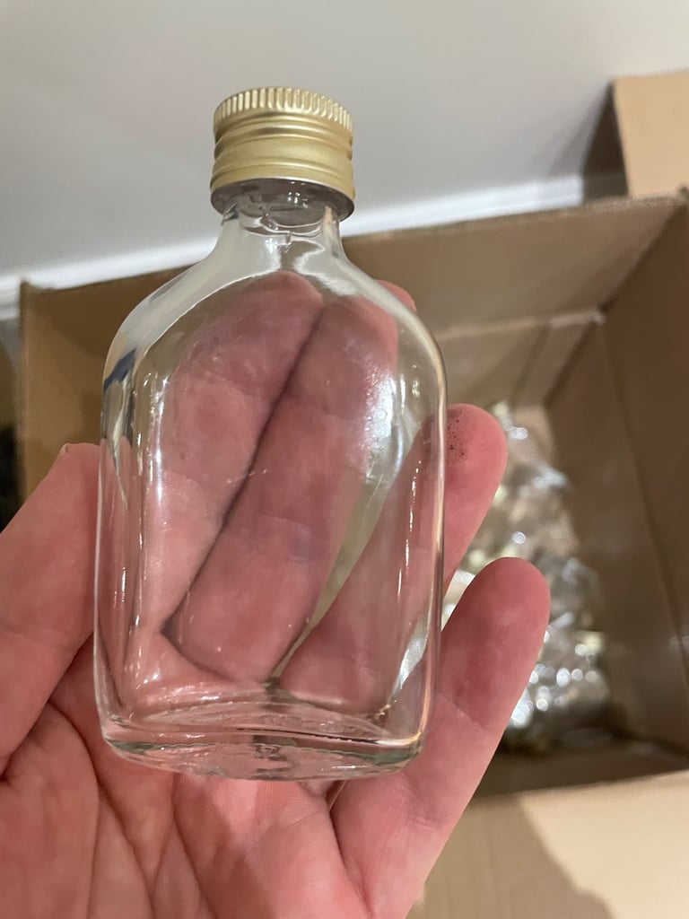 image for 50ml glass bottles with gold caps
