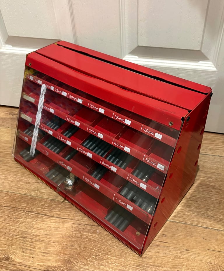 image for Drill bit cabinet with some drill bits inside