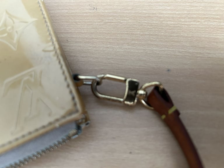 Louis Vuitton Beige Monogram Beige Remix Pochette Lexington handbag.